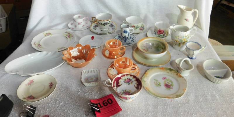 lot 160 image: many china pieces some cups and saucers and more