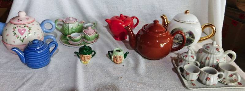 lot 209 image: Decorative serving teapots