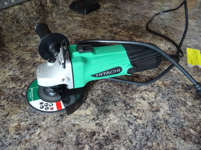 lot 53 image: Hitachi 4 12 Grinder, New