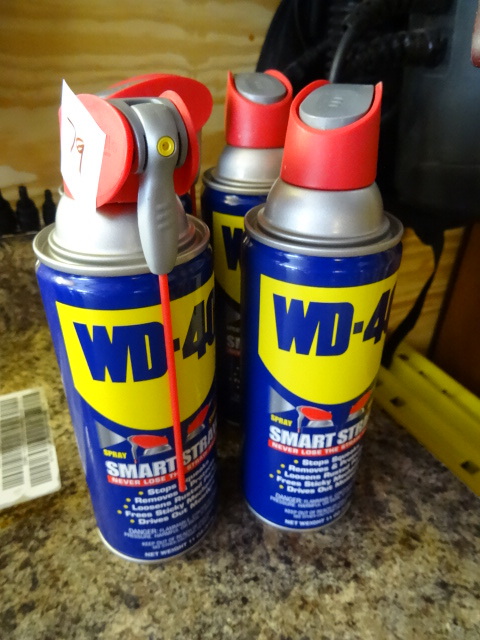 lot 79 image: 4 New Cans of WD 40