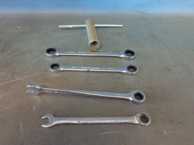 lot 36 image: 4 Metric Wrenches & Plug Wrench