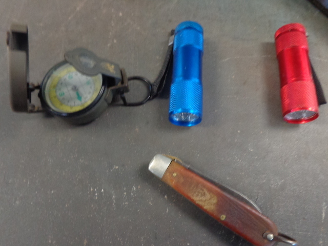 lot 306 image: Flashlight, Trimmers Compass