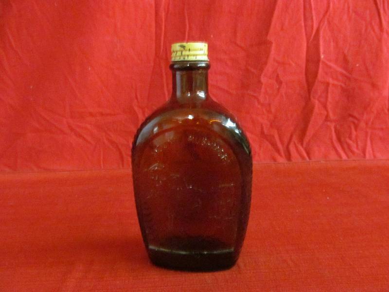 Log Cabin syrup bottle-Mount Rushmore