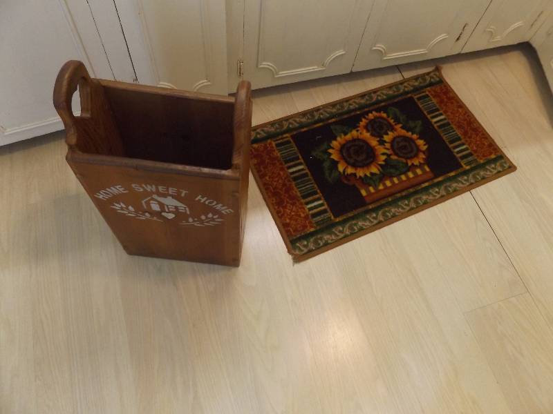 Garbage Can and Rug