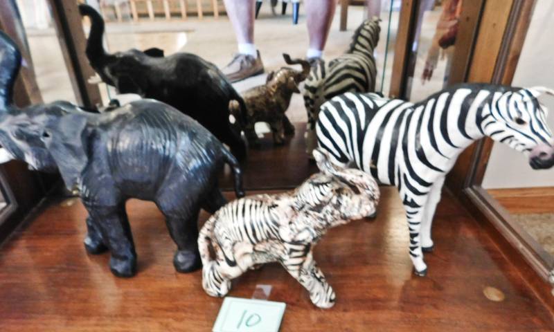 lot 10 image: elephant and zebra figurines