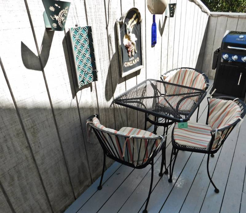 lot 19 image: Outdoor bistro set table chairs and all dcor items