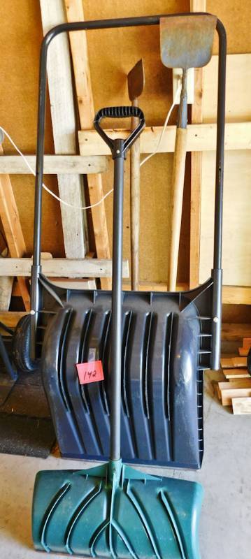 lot 142 image: snow shovels and ice chippers