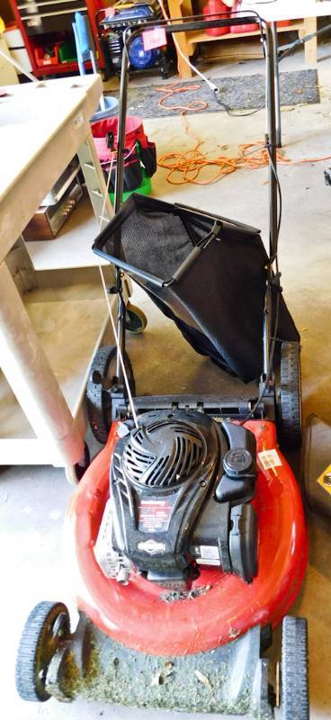 lot 147 image: 22 Yard machine lawn mower new this spring