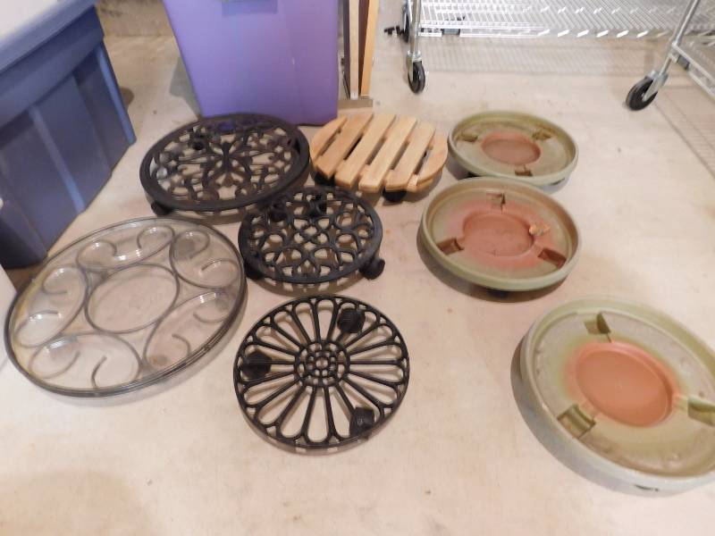 lot 200 image: several rolling plant holders metal and wood