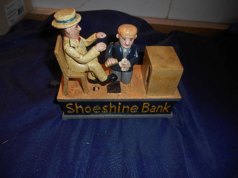 lot 33 image: VINTAGE CAST IRON SHOE SHINER BANK