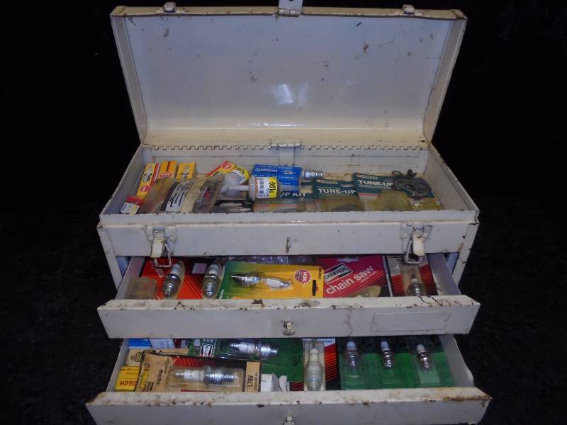 lot 32 image: Metal Toolbox w Small EngineOutboard Plugs & Repair Kits (mostly new)