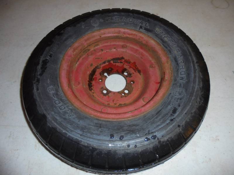 lot 70 image: Tire - US Royal 4.00x8 Wheelbarrow Tire on Rim