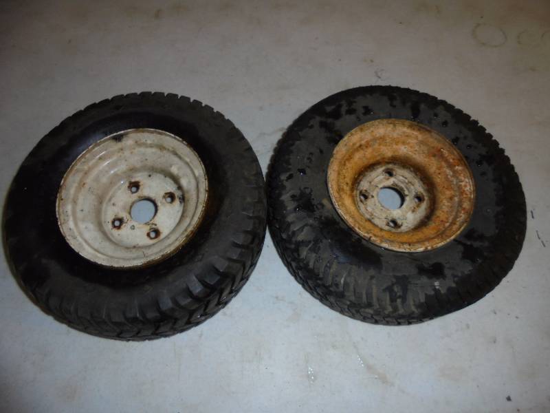lot 74 image: 2 Turf Tires on 4 Hole Rims 13x5.00x6