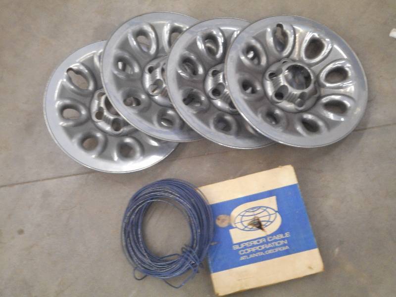 lot 21 image: Lot Of (4) Wheel Hubcaps & 22AWG Wi...