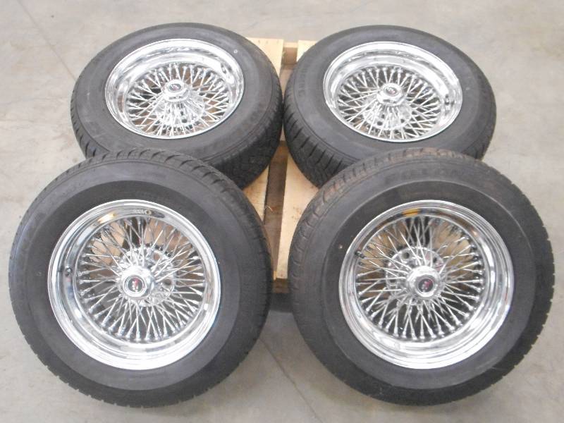 lot 29 image: (4) 5-Lug Dayton 15 Spoke Wheels W...