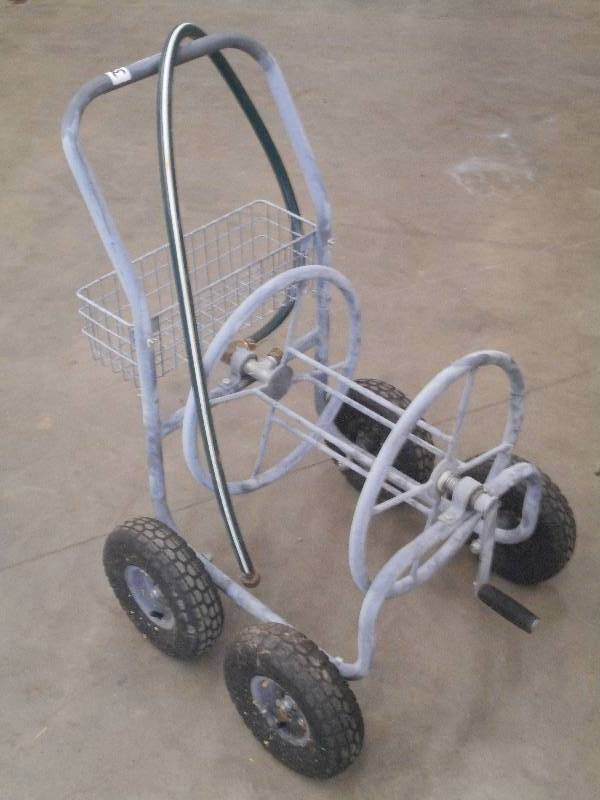 lot 38 image: Garden Hose Cart With Whip Hose ...