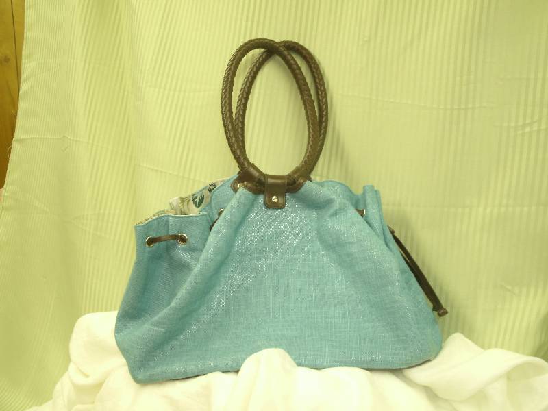 lot 6 image: Made  Exclusively for Jennifer Lopez Troopical Handbag