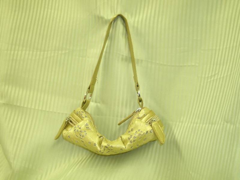 lot 9 image: Micro Purse gold tone