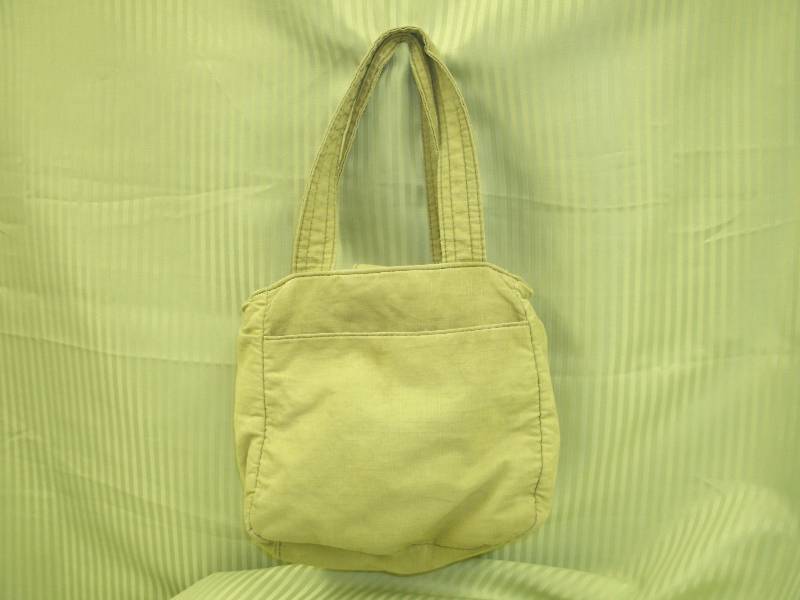 lot 24 image: Green mini Cargo Purse