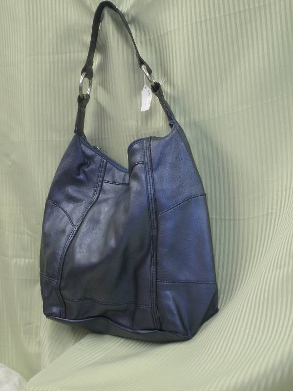 lot 36 image: Blue leather look purse