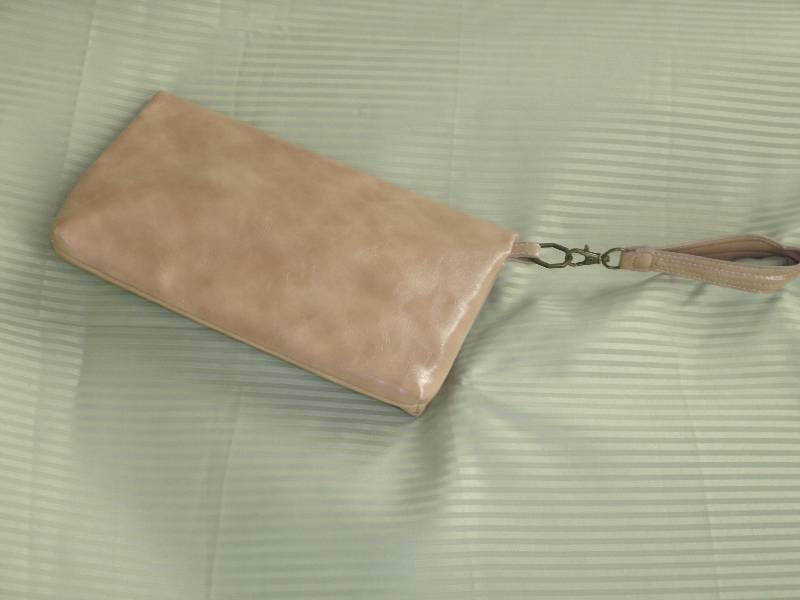 lot 55 image: Pink Clutch Purse