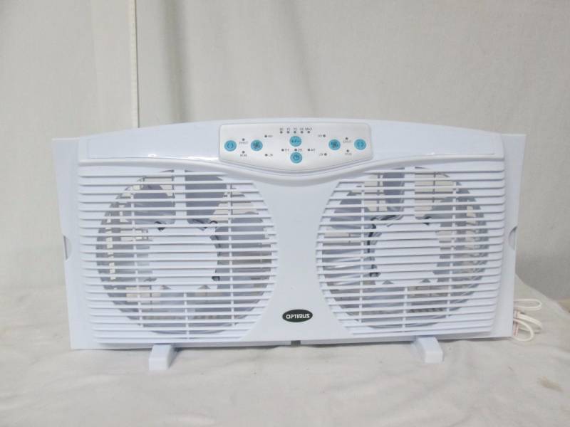 lot 47 image: Optimus Electrically Reversible Twin Window Fan