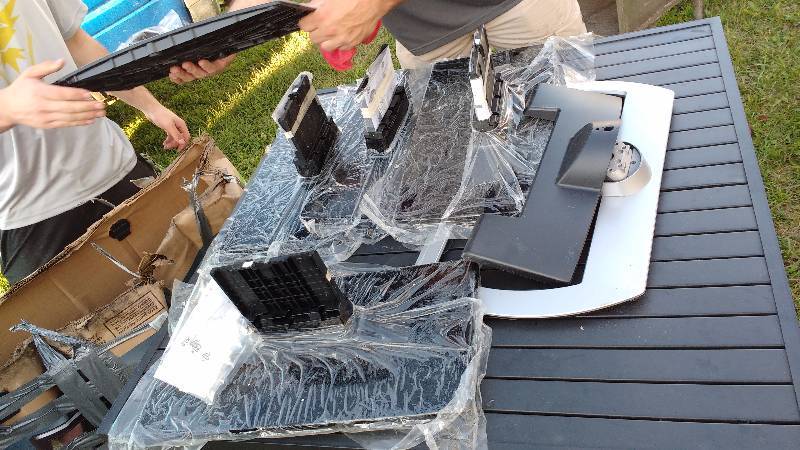 Misc. Box of Insignia TV Stand