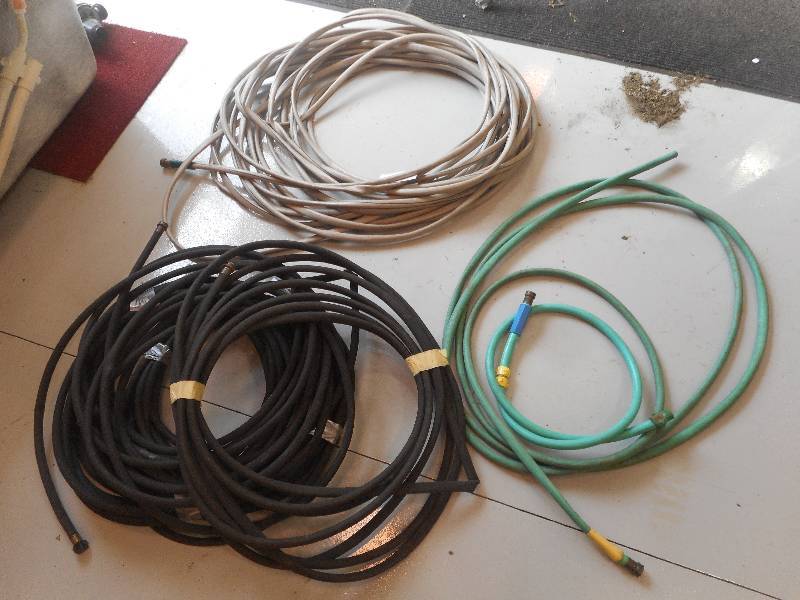 lot 54 image: Lot Of (4) 50ft & (1) 100ft Garden...