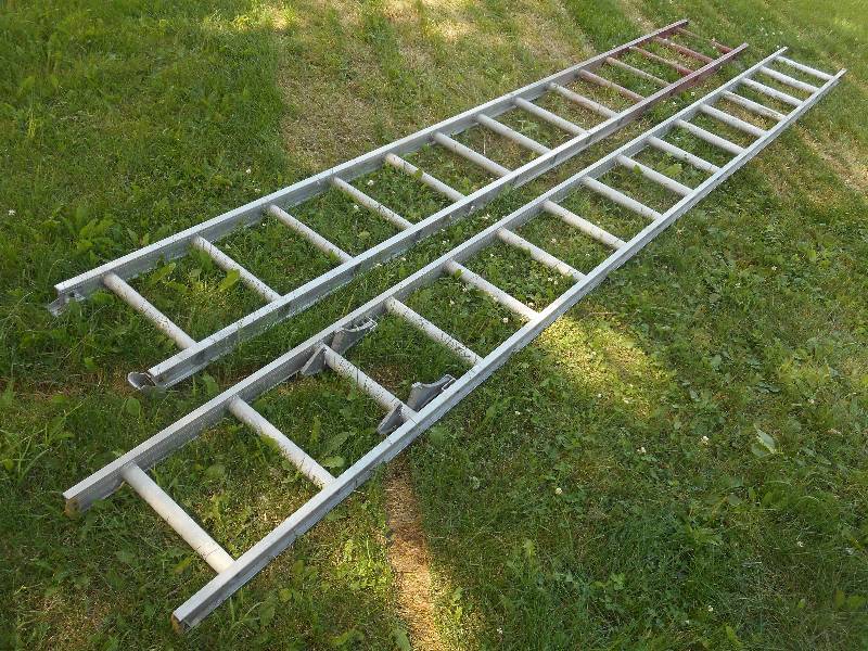 lot 201 image: 2-Piece 24ft Aluminum Extension Lad...
