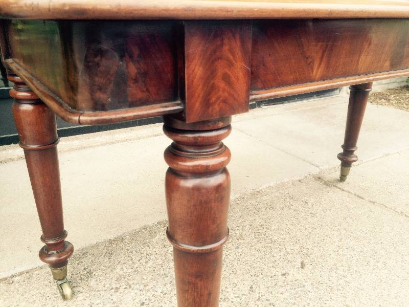 Mid-Victorian Mahogany Writing Table on Brass Casters