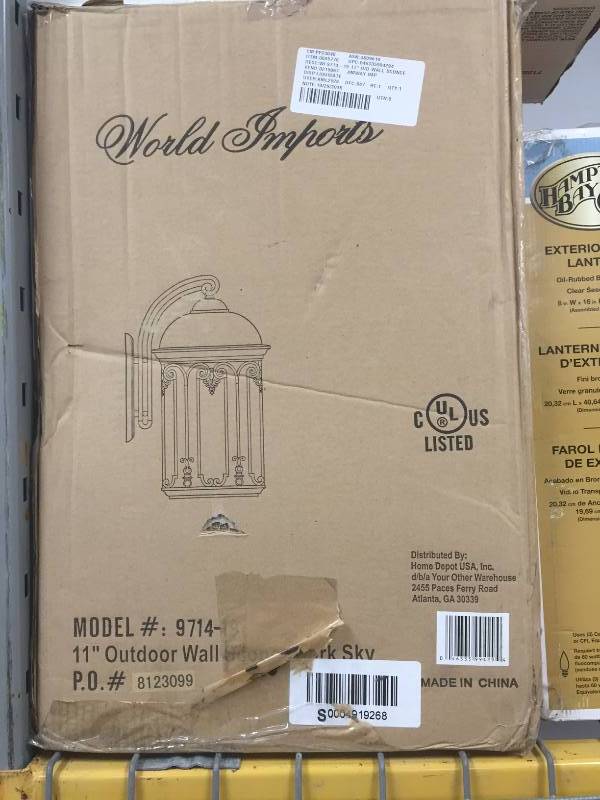 lot 60 image: World Imports  Dark Sky 11 in. Old Bronze Outdoor Wall Sconce Model # 9714-19 New