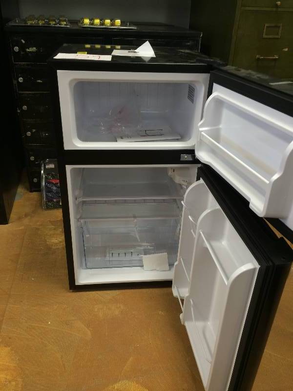 lot 59 image: Haier 3.2 cu ft 2-Door Refrigerator, Black  WORKING CONDITIONS