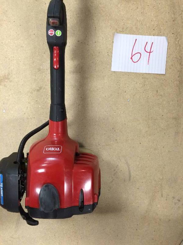 lot 64 image: Toro 2-Cycle 25.4cc Attachment Capable Straight Shaft Gas String trimmer used working conditionS