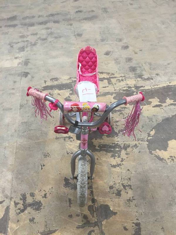 lot 17 image: 12 Huffy Disney Princess Girls Bike with Doll Carrier