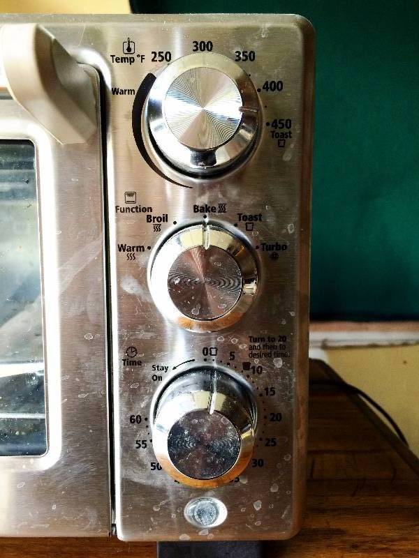 lot 19 image: Nice Stainless Oster Toaster Oven - Works Great  Needs a little cleanup...