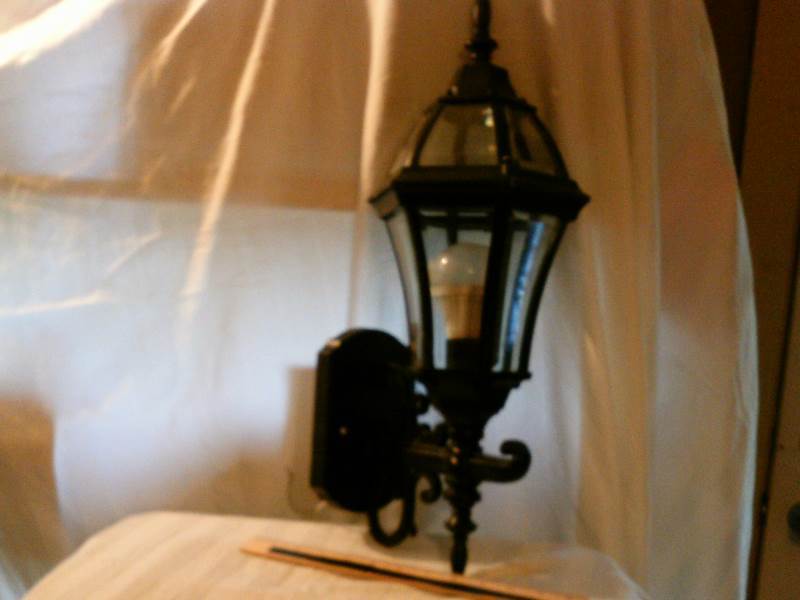 Black exterior carriage light