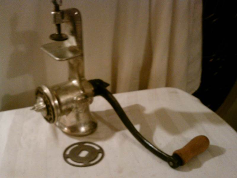 Meat grinder with attachment