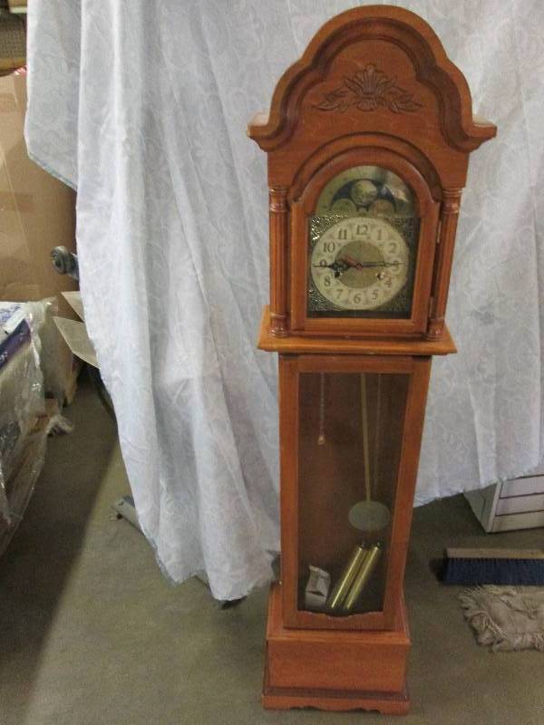 59 tall clock, runs on C Battery...