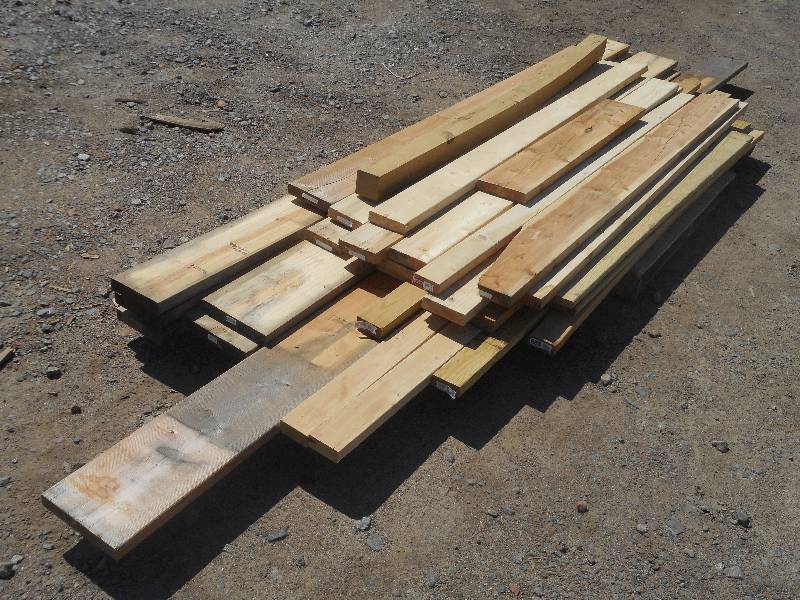 lot 5 image: Pallet Of Unued Lumber (1) 2x10x...