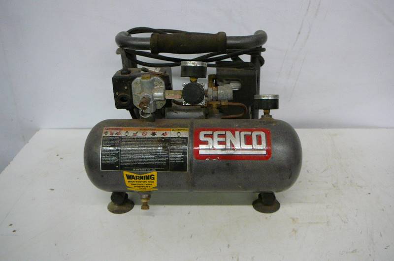 lot 35 image: Senco Air Compressor model PC1010 12 hp Tank size 1 gal Runs and Pumps