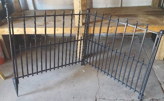 lot 42 image: Black Yard Fence with Stake
