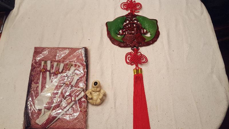 lot 43 image: Chinese Wall Hanging Faux Jade Fish Carved Resin Red Knots and Misc.