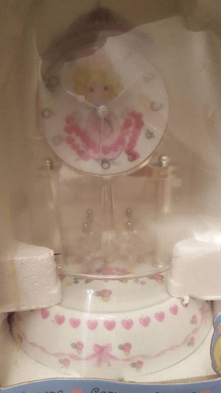 lot 57 image: Precious Moments Porcelain Anniversary collectable clock you have touched so many hearts