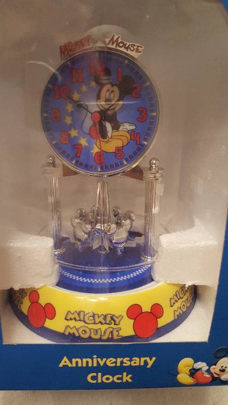 lot 61 image: Disney Mickey Mouse Anniversary Clock.
