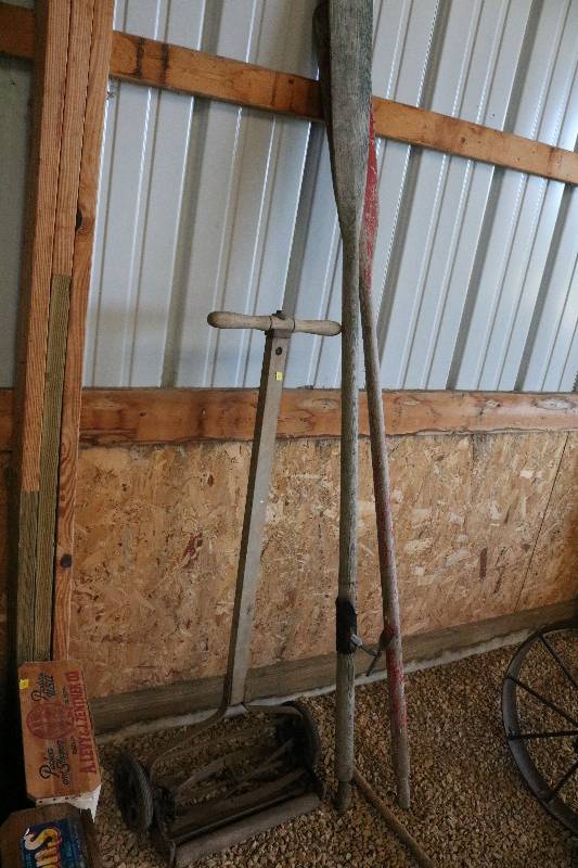lot 80 image: Antique oars and push reel mower