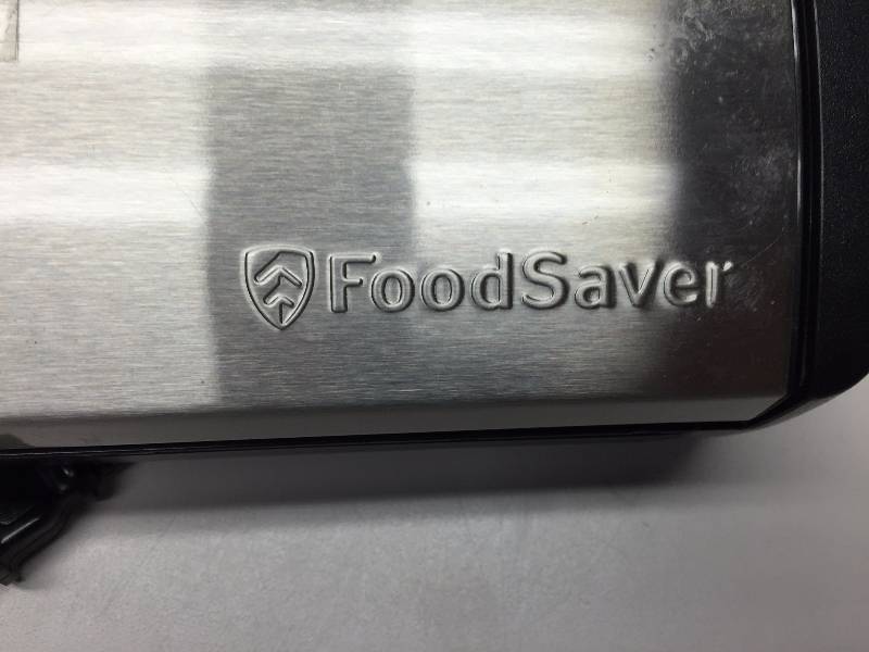 lot 13 image: FOOD SAVER VACUUM SEALER