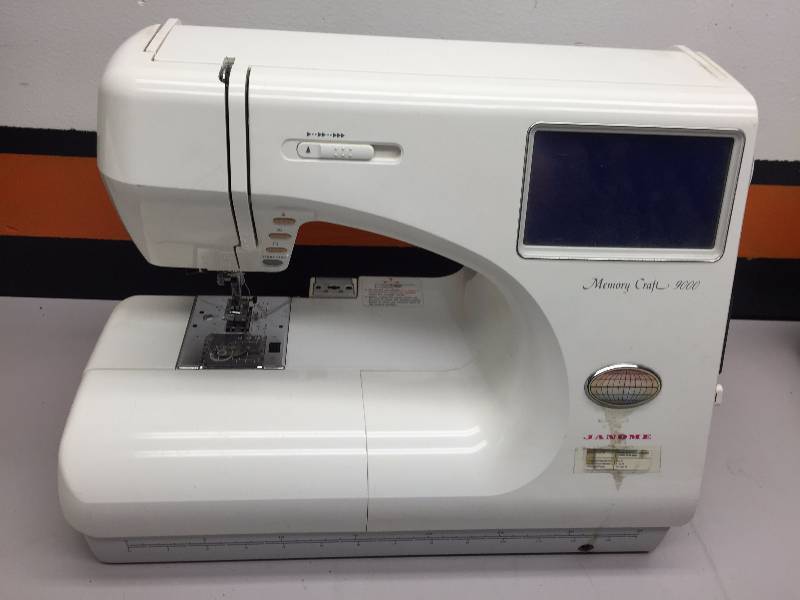 lot 21 image: JANOME MEMORY CRAFT SEWING MACHINE NO CORD, LECO EMBROIDERY MACHINE NO CORD