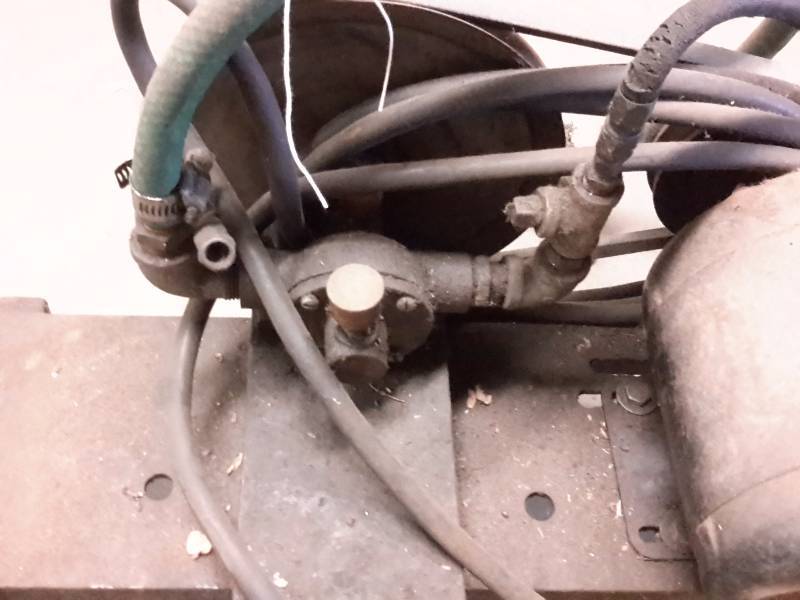 lot 43 image: General Electric 14 H.P. Motor with Pump.. They used this to pump coolant..
