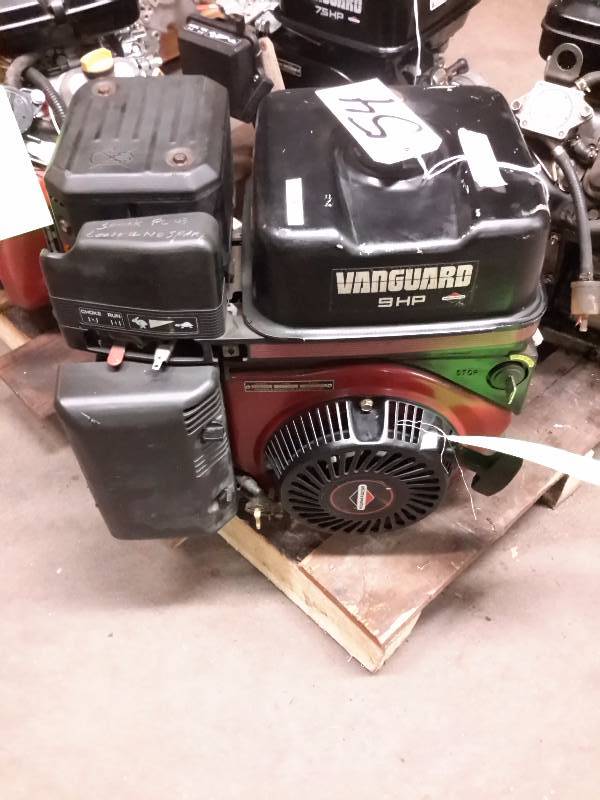 lot 54 image: VANGUARD, 9 H.P. ElectricManual.. Spark Plug is loose, so not sure what is up with that.. Please inspect