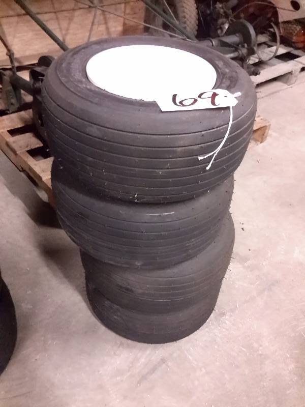 lot 69 image: 5, 16 x 6.5 x 8 in Tires as shown.. With Rims
